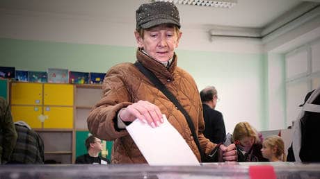 Poland heads to runoff in tight presidential race